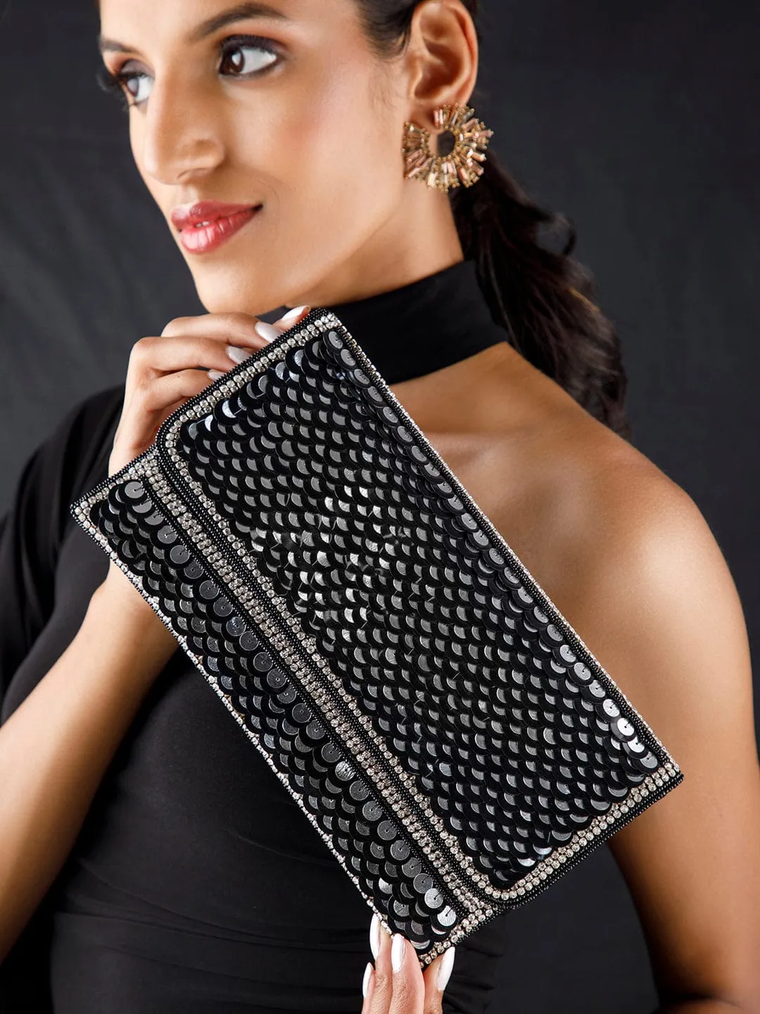Rubans Silver Colour Clutch With Black Embroided Design.